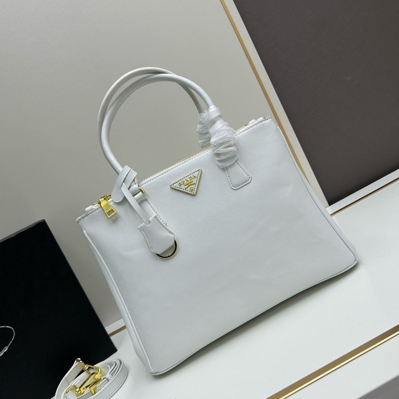 Pra*a top handle bags